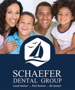 A smiling family of four, including a woman, a man, and two children, poses above a blue banner featuring a sailboat logo and the text: Schaefer Dental Group. Look better ... Feel better ... Be better.